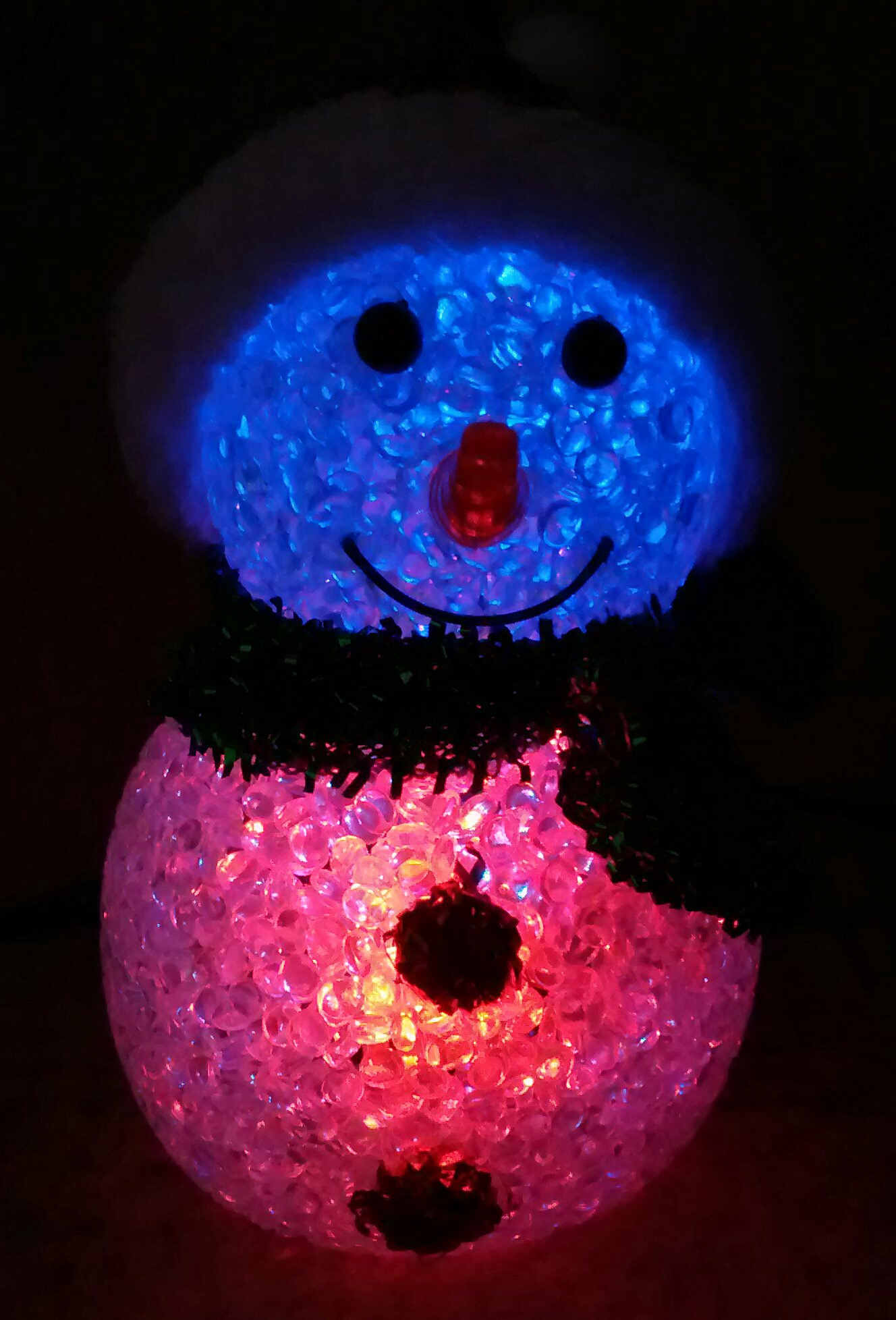 blue and red glowing snowman